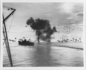Smoke rises from the USS San Francisco off Guadalcanal on Nov. 12, 1942 (via NHHC)
